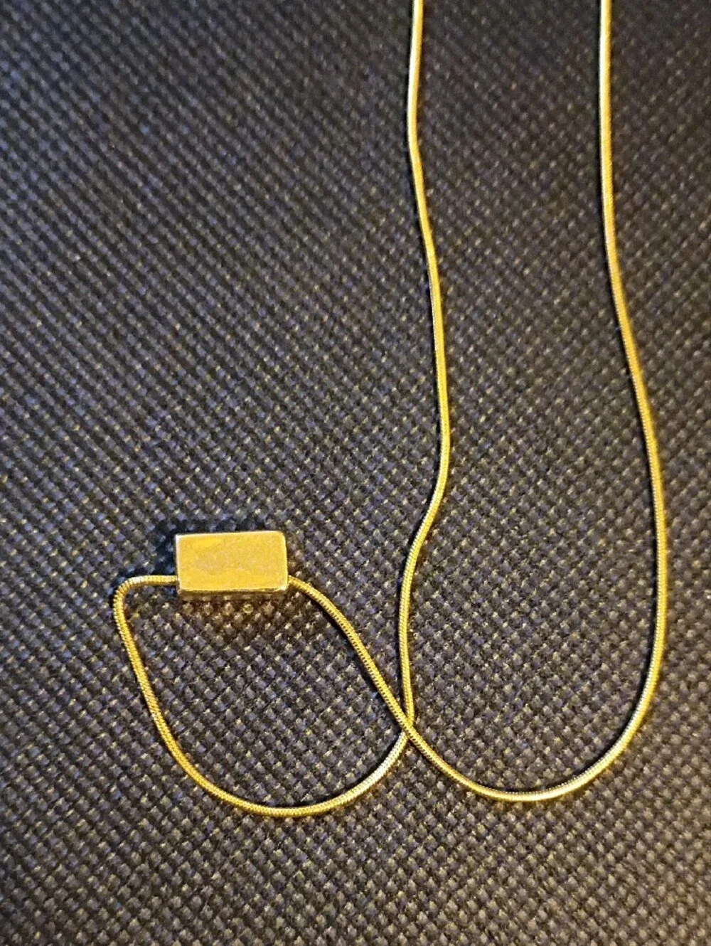 Tommy Hilfiger gold tone